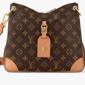 Woman’s Louis Vuitton purse